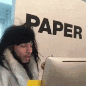 Gif of romance scammer/catfish making paper